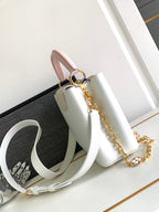 LOUIS VUITTON CAPUCINES BB 27 IN WHITE MIX PINK AND BEIGE TAURILLON GOLD HARDWARE