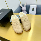 CHANEL THICK-SOLED SLIDE IN LIGHT YELLOW LAMBSKIN AND WOOL LINING