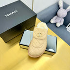 CHANEL THICK-SOLED SLIDE IN LIGHT YELLOW LAMBSKIN AND WOOL LINING