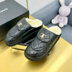 CHANEL THICK-SOLED SLIDE IN BLACK LAMBSKIN AND WOOL LINING