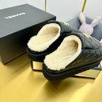 CHANEL THICK-SOLED SLIDE IN BLACK LAMBSKIN AND WOOL LINING