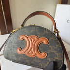 CELINE HALF MOON CASE 18 IN BLACK TRIOMPHE CANVAS AND BRONZE BROWN CALFSKIN