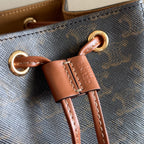 CELINE MICRO SAILOR 17 IN BLACK TRIOMPHE CANVAS AND BROWN CALFSKIN TRIM