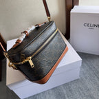 CELINE VANITY 18 IN BLACK TRIOMPHE CANVAS AND BROWN CALFSKIN GOLD HARDWARE