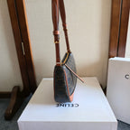 CELINE 25S SHOULDER BAG 21MM IN BLACK TRIOMPHE CANVAS AND BORWN CALFSKIN