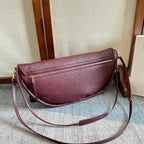CELINE 25S HALFMOON SOFT TRIOMPHE BAG 46MM IN SYRAH RED SUPPLE SHINY LAMBSKIN
