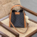 CELINE 25S SMALL CUBE BAG 21MM IN BLACK TRIOMPHE CANVAS AND BORWN CALFSKIN
