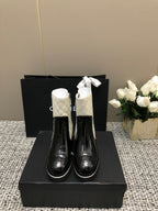 CHANEL ROUND-TOE SHORT BOOTS BLACK MIX WHITE SHEEPSKIN
