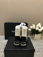 CHANEL ROUND-TOE SHORT BOOTS BLACK MIX WHITE SHEEPSKIN
