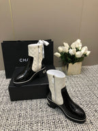 CHANEL ROUND-TOE SHORT BOOTS BLACK MIX WHITE SHEEPSKIN