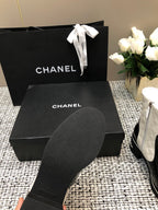 CHANEL ROUND-TOE SHORT BOOTS BLACK MIX WHITE SHEEPSKIN