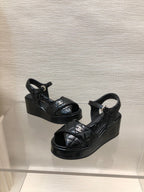 CHANEL WEDGE SANDALS IN BLACK CALFSKIN