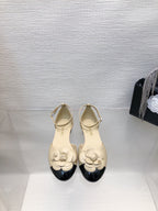 CHANEL BEIGE MIX BLACK LAMBSKIN CAMELLIA HOLLOW SANDAL