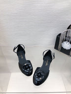 CHANEL BLACK LAMBSKIN CAMELLIA HOLLOW SANDAL