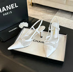 CHANEL MESH LOGO SLINGBACKS IN WHITE LAMBSKIN