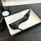 CHANEL MESH LOGO HEELS IN BLACK LAMBSKIN