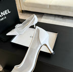 CHANEL MESH LOGO HEELS IN WHITE LAMBSKIN