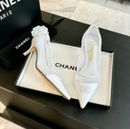 CHANEL MESH LOGO HEELS IN WHITE LAMBSKIN