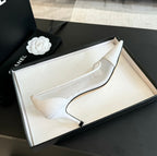 CHANEL MESH LOGO HEELS IN WHITE LAMBSKIN