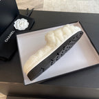 CHANEL SLIPPERS IN WHITE FUR