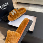 CHANEL SLIPPERS IN SAFETY ORANGE FUR