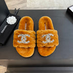 CHANEL SLIPPERS IN SAFETY ORANGE FUR