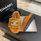 CHANEL SLIPPERS IN SAFETY ORANGE FUR