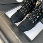 CHANEL LACE-UP SHORT BOOTS IN BLACK SUEDE