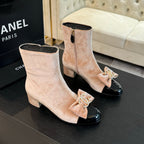 CHANEL SHORT BOOTS IN PEACH PINK VELVET AND BLACK LAMBSKIN