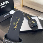 CHANEL FLAT MULE IN BLACK LAMBSKIN