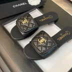 CHANEL FLAT MULE IN BLACK LAMBSKIN