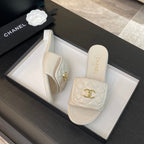 CHANEL FLAT MULE IN WHITE LAMBSKIN