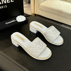 CHANEL HIGH FLATFORM SLIPPER IN WHITE EMBOSSED SHEEPSKIN