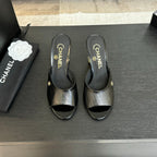 CHANEL T-STRAP PEARL HEEL 85 MM SANDALS IN BLACK LAMBSKIN MULE