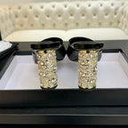 CHANEL T-STRAP PEARL HEEL 85 MM SANDALS IN BLACK LAMBSKIN MULE