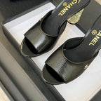 CHANEL T-STRAP PEARL HEEL 85 MM SANDALS IN BLACK LAMBSKIN MULE