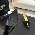 CHANEL HIGH HEEL MULE 65 MM IN BLACK SUEDE