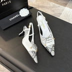 CHANEL HIGH HEEL SLINGBACKS 65 MM IN WHITE WITH SNAKESKIN PATTERN LAMBSKIN