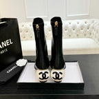 CHANEL PEARL BOOTS 65MM IN BLACK CALFSKIN