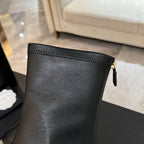 CHANEL PEARL BOOTS 65MM IN BLACK CALFSKIN
