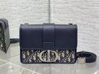 DIOR MONTAIGNE EAST-WEST 24 BAG WITH CHAIN IN NAVY BLUE LAMBSKIN AND MONOGRAM JACQUARD