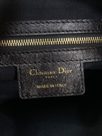 DIOR 25S SMALL VOYAGE BAG 23 IN BLACK FLAT MACROCANNAGE GRAINED GLOSSY CALFSKIN