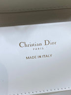DIOR 25S TOUJOURS VERTICAL TOTE BAG 18 IN IVORY CALFSKIN WITH CHARM BRACELET STRAP