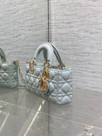 DIOR 25S SMALL LADY D‑JOY BAG 22 IN SHIRT BLUE CALFSKIN GOLD HARDWRE