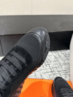 HERMES BOUNCING SNEAKER IN BLACK CALFSKIN AND FABRIC
