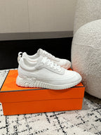 HERMES BOUNCING SNEAKER IN WHITE CALFSKIN AND FABRIC
