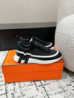 HERMES BOUNCING SNEAKER IN BLACK MIX WHITE CALFSKIN AND FABRIC