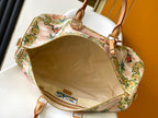 LOUIS VUITTON KEEPALL BANDOULIÈRE 50 IN SAND TROPICAL MOTIFS MONOGRAM SURFIN CANVAS