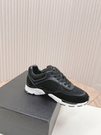 CHANEL TRAINERS IN BLACK SUEDE AND CALFSKIN