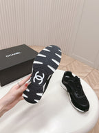 CHANEL TRAINERS IN BLACK SUEDE AND CALFSKIN